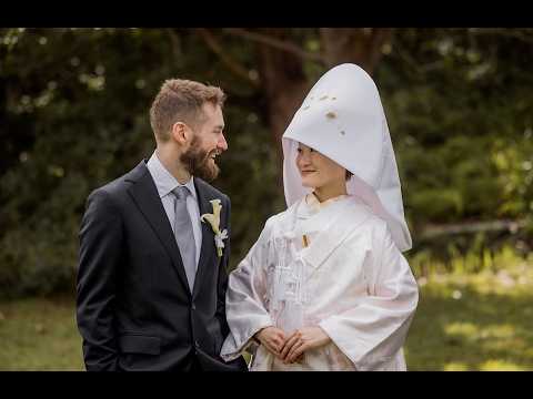 Bride in traditional Japanese shiromuku kimono with groom in navy suit at outdoor Sydney wedding ceremony
