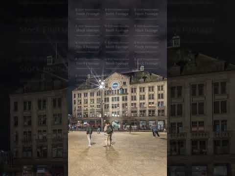 The Dam square in Amsterdam night timelapse hyperlapse, The Netherlands.