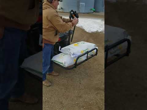 ATV Vertical Swivel Game LIft Carrier using hand winch - lift demo with seed bags