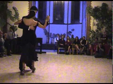  Maria Ines Bogado  and  Sebastian Jimenez  are  dancing  to  the  milonga  "  No Hay Tierra Como La Mia  "