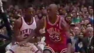 Michael Jordan lefty hook shot over Gerald Wilkins and Ewing