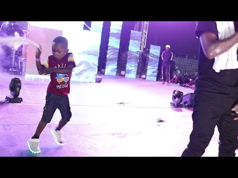 See the small Agege boy that steals the show While Dancing With Small doctor at concert