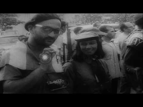 Crowd in Cuba demonstrates against reminders of the ousted Batista regime, as fir...HD Stock Footage