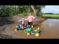 Playing on the farm in the mud | Our tractors get stuck | Kids mudding