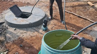 Motorized water pumping from a manually dug well