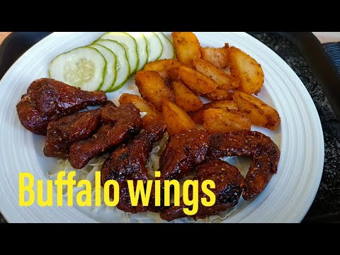 Yiga okola BBQ chicken wings ne BBQ sauce . #ugandankitchen #chickenwings #barbecue