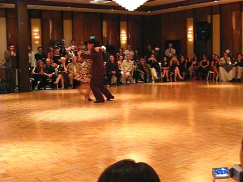  Fernando Sanchez  and  Ariadna Naveira  are  dancing  to  the  tango  "  Saludos  "