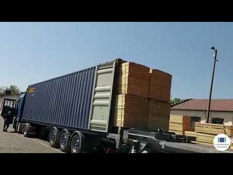 Loading Timber into the Container, directly on the TIR chassis, using Container Filler technology
