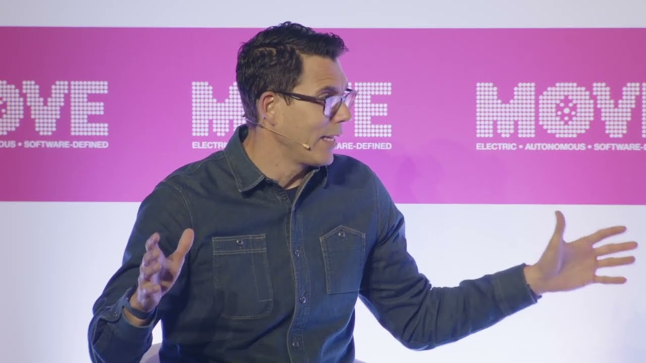 Rivian CEO RJ Scaringe interviewed on the MOVE 2026 keynote stage