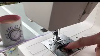 How to load a bobbin in a top loading Janome sewing machine