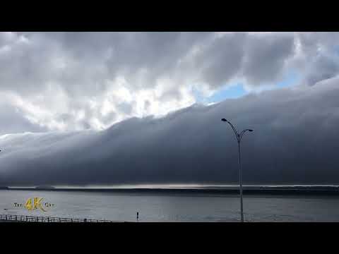 Amazing morning glory arcus cloud rolling over Canadian coastal skies