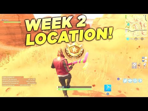 fortnite search between an oasis rock archway and dinosaurs location week 2 battle star challenge - fortnite search between dinosaurs