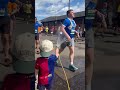 'Little Hero' Hoses Down Marathon Runners as Dozens Hospitalized During Heatwave