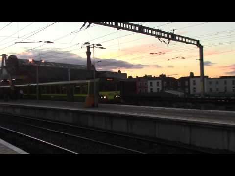Irish Rail 8100 EMU 8126 +  8135 arrives & 29000 DMU 29027 departs Dublin Connolly
