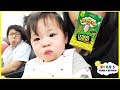 Twin Babies first airplane ride and Kid Warheads Sour Candy Challenge