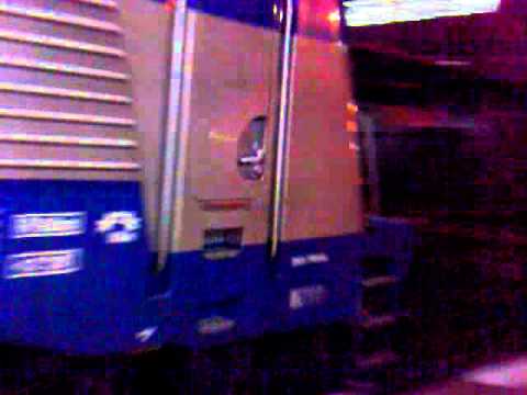 Prujezd ČD 380.006-7 na poštovním vlaku stanicí Olomouc hl.n