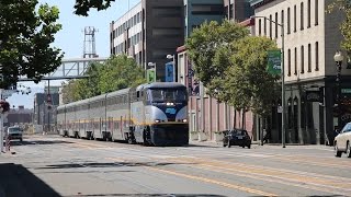 preview picture of video 'Amtrak California Trains at Jack London Square in Oakland (Street Running)'
