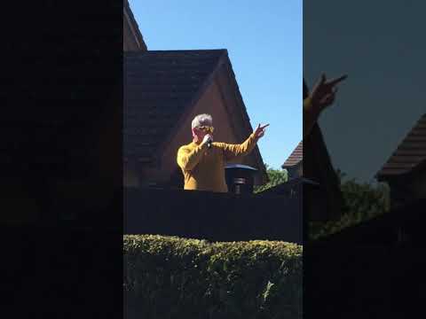 Roy Sinclair entertaining his neighbours during covid19 in Prestatyn, Wales UK