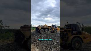 Yükünü Arkaya Doğru İterek Boşaltan Belden Kırmalı Kamyon CAT 740 EJ