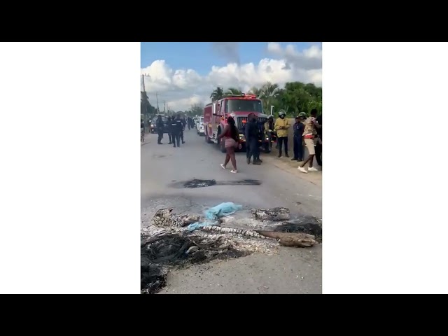 WATCH: Fiery protest in Old Harbour Bay after police killing - Vimarsana News