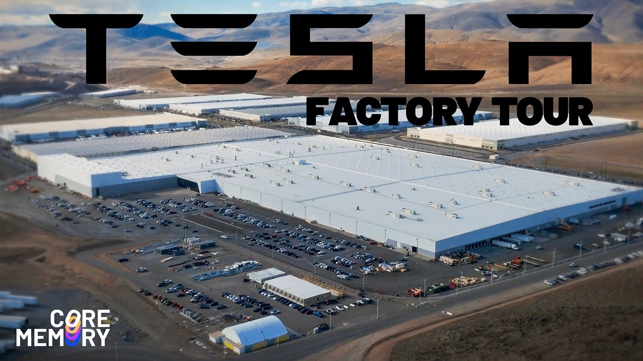 Inside the Tesla Semi factory in Sparks Nevada, showing the overhead conveyance system carrying semi truck frames through the assembly line