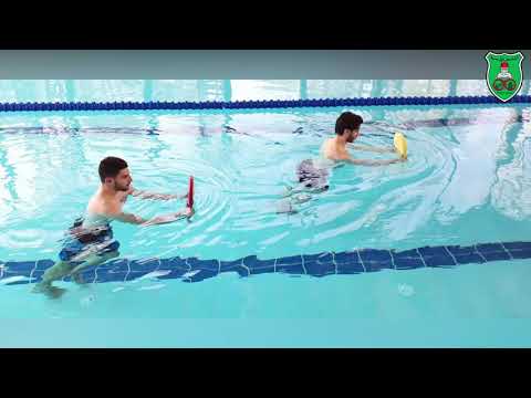 Aquatic exercise- Walking in water with kick-boards