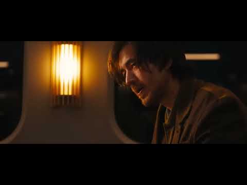 Bullet Train trailer frame with neon-lit aisle during a fight setup