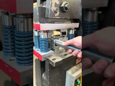 This custom die set takes the hassle out of flattening and punching round material