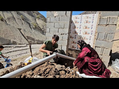 Building a country house.  Babak installed water and sewage pipes for the kitchen and bathroom