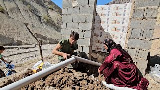 Building a country house.  Babak installed water and sewage pipes for the kitchen and bathroom