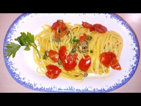 Spaghetti con lampade al profumo di ricci di mare