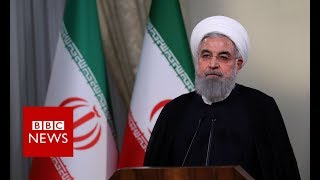 Irans President Hassan Rouhani responds to the Tru