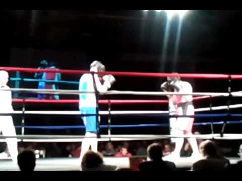 Jason Gilbert (blue) White collar fight-Rumble in Red Deer 14-05-2011.3gp
