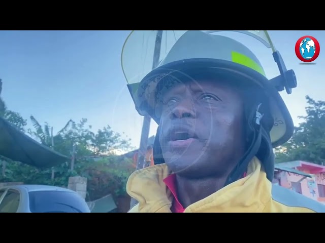 A woman is feared dead and a man is battling for his life at hospital after the heavy unit they were travelling in went over a precipice off Spur Tree Hill in Manchester on Tuesday morning.