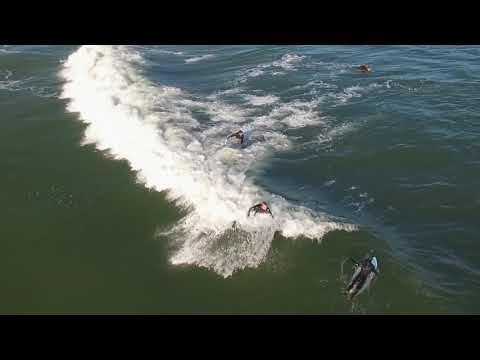 Drone footage of waves and surfers at Wildwood