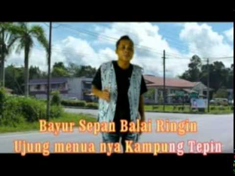 Micky M Ambai Remun Menua Serian