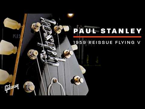 Paul Stanley shows Mark Agnesi his “best sounding guitar”