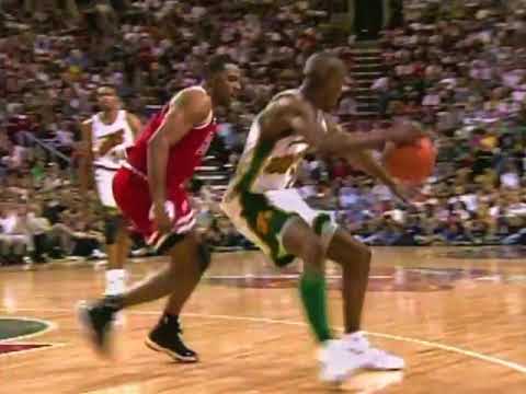 Gary Payton does the James Brown jazz splits while dribbling