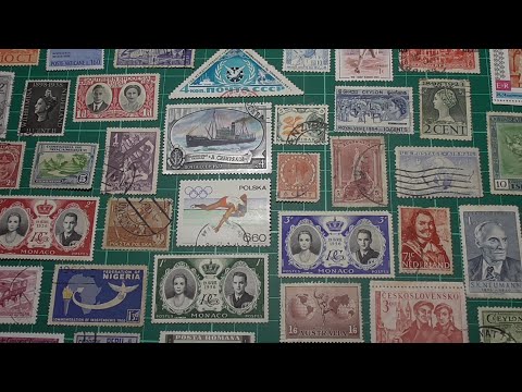 Sorting through a packet of stamps - #philately #stamps