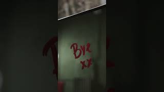 Writing The Word Bye On A Mirror Using A Lipstick
