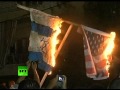 Протестующие в Ливане сжигают флаги США и Израиля 