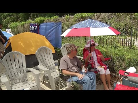 Trump supporters traveling from near and far line the streets outside an Orlando arena camping out ahead of the President’s speech Tuesday. (June 17)