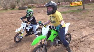 kids riding their new dirt bike on the track for the first time. Let's