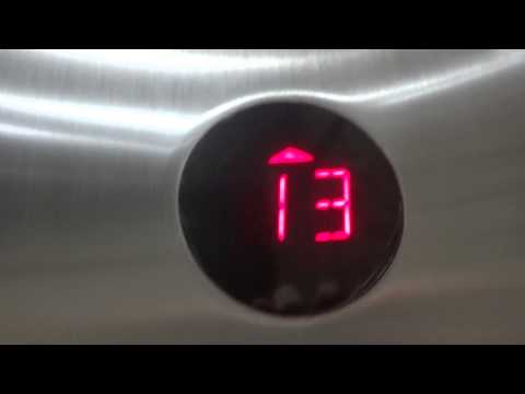 Elevator Duo: Otis Lexan High Rise Traction Elevators at 24 Greenway Plaza