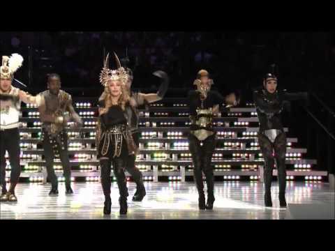 Η Madonna [Μαντόννα] ανοίγει με το "Vogue" το θέαμα του ημιχρόνου στο Super Bowl της 5ης Φεβρουαρίου 2012, στο Lucas Oil Stadium της Ινδιανάπολης, σε μια από τις πληρέστερες σύγχρονες εκδοχές του υπερθεάματος.