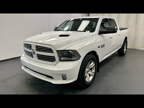 2015 Ram 1500 4WD Crew Cab 6.4 Ft Box Sport in White for sale at Davis GMC Buick Lethbridge in Lethbridge, AB