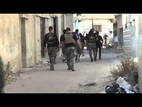 انتشار عناصر ألوية الفرقان في احدى الجبهات في مدينة درعا