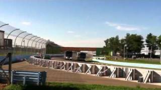 Phish tour buses racing at the Watkins Glen race track 1/2