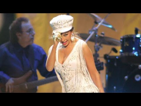 Videoclip de Amor Prohibido — Thalia