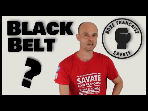 What is the equivalent of a black belt in Savate?